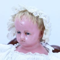 A Pierotti poured wax shoulder head baby doll, English 1860s,