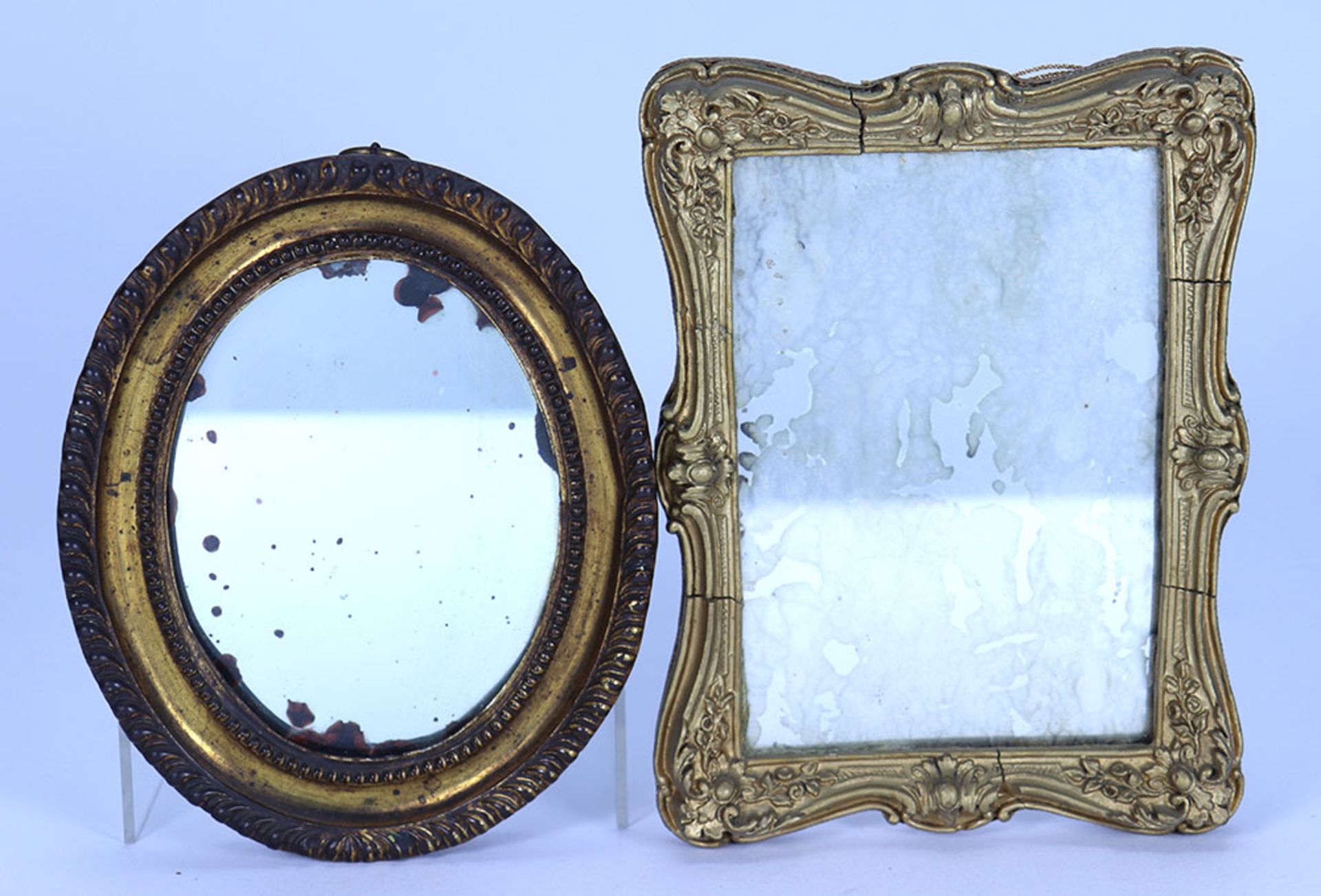 A pair of painted gold framed mirrors, 19th century,