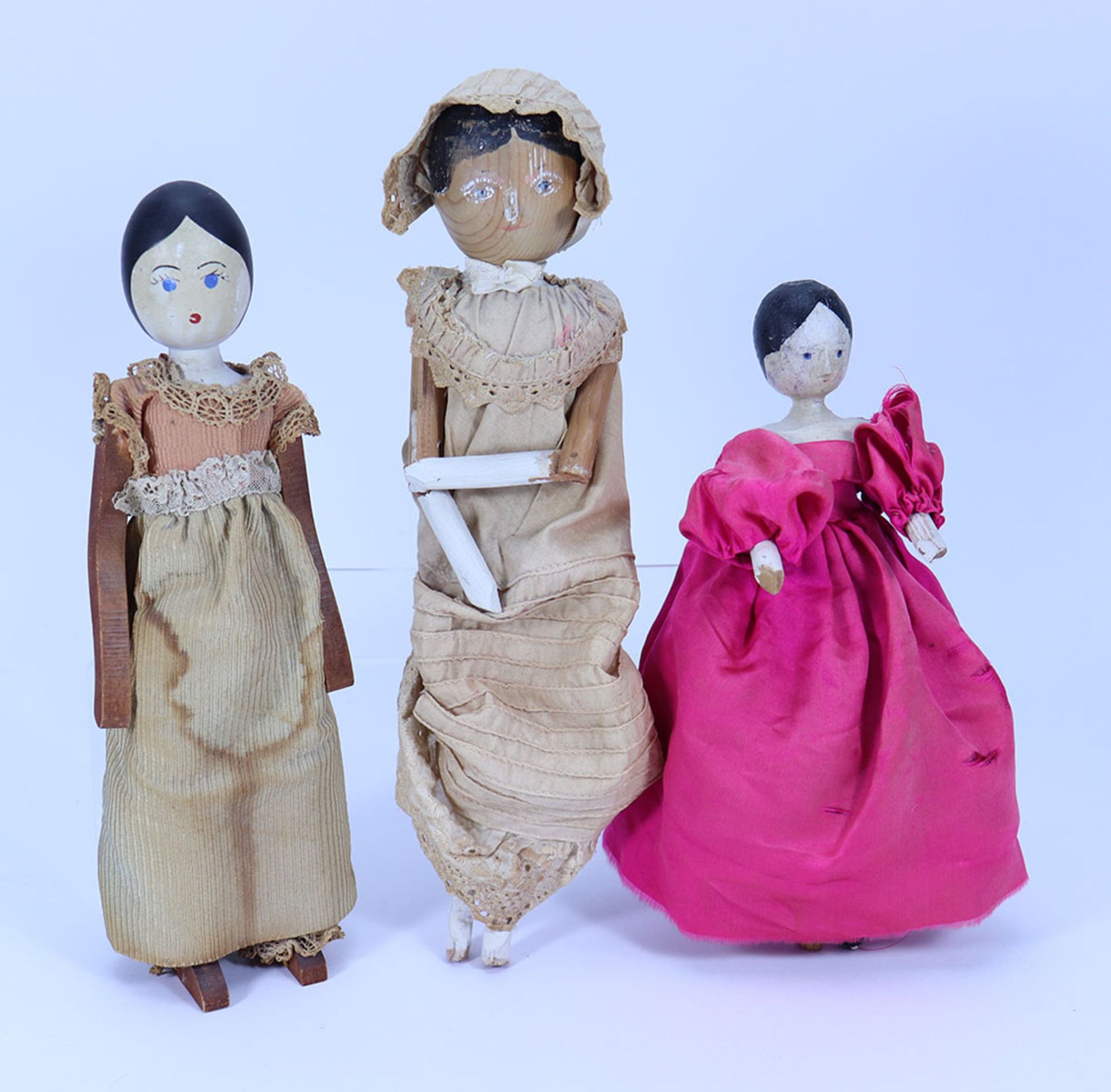 Three peg wooden dolls,