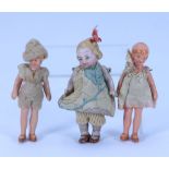 A miniature all-bisque doll in original clothes, German circa 1920,