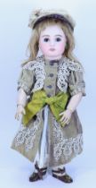 A large Steiner Figure A bisque head Bebe doll, size 17, French circa 1890,