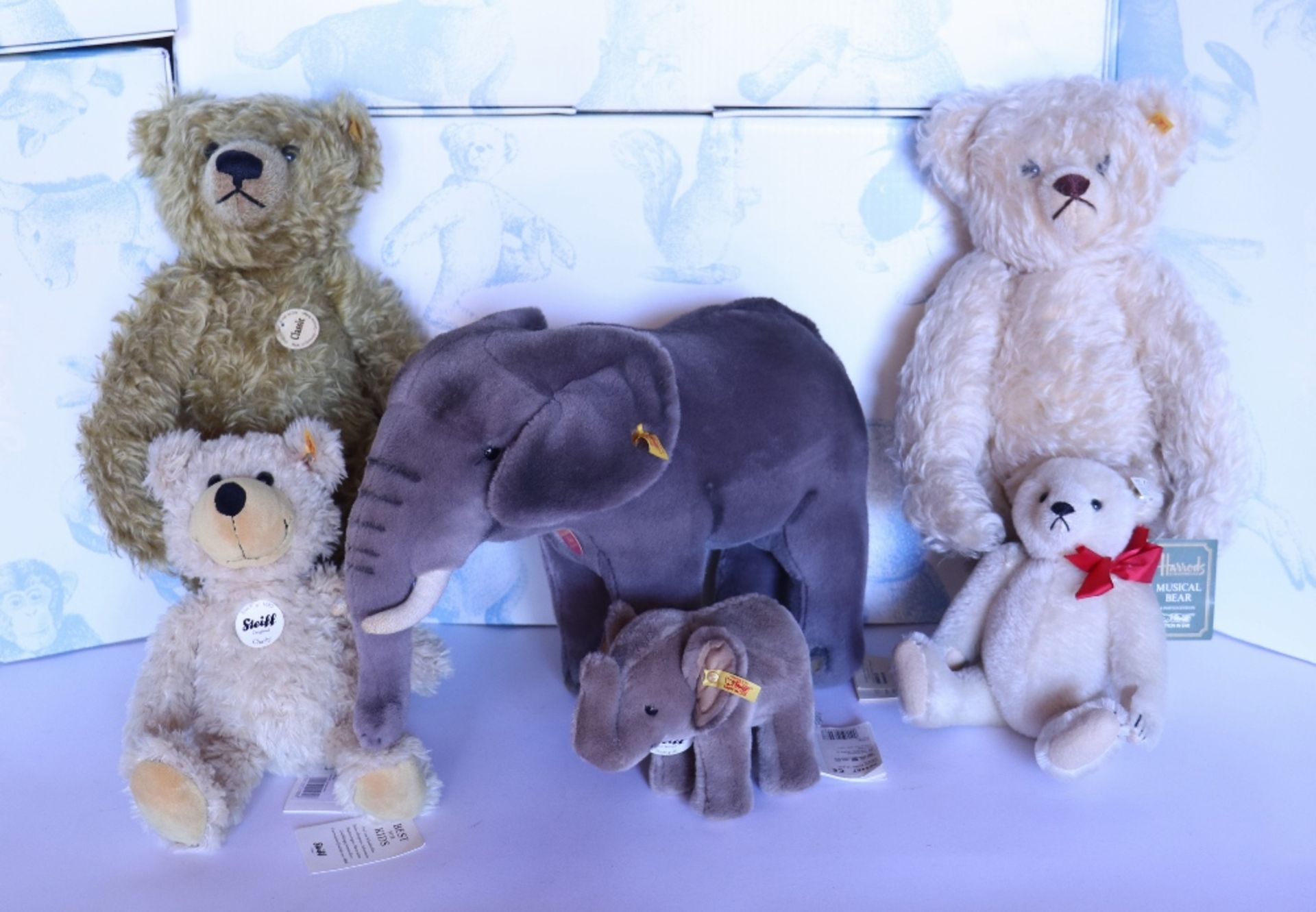 Collection of Modern Steiff white and yellow tag bears and soft toys,