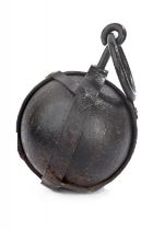 A rare iron legcuff ball