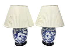 Pair of blue and white table lamps of ovoid form