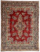 Persian Kirman crimson ground carpet