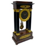 French - Napoleon III 8-day Portico clock in a rosewood and ebony case with circular turned pillars