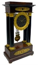 French - Napoleon III 8-day Portico clock in a rosewood and ebony case with circular turned pillars