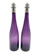 Pair of Victorian amethyst glass decanters