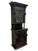 19th century heavily carved and stained oak cabinet on cupboard