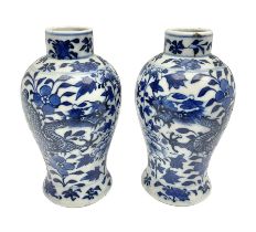 Pair of late 19th/early 20th century Chinese blue and white vases