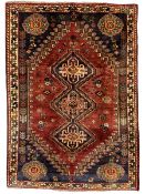 Persian Shiraz dark crimson ground rug