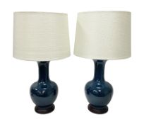 Pair of Chinese teal glazed table lamps