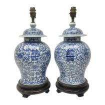 Pair of 20th century Chinese blue and white jars and covers