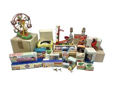 Twenty six tinplate models to include Ferris Wheel and Performing Circus Elephant