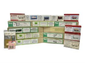 Eighteen boxed '0' gauge model railway kits for coaches and wagons from various makers