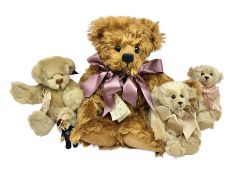 Group of five teddy bears comprising ‘George’ a unique pellet filled bear with glass eyes and velvet