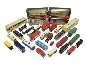 Thirty-one modern die-cast models of buses