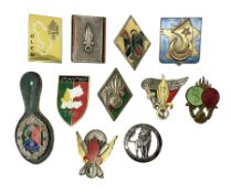 Eleven French Foreign Legion badges including various para