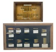 SECTION 1 FIRE-ARMS CERTIFICATE REQUIRED - Two cased specimen displays of annotated ammunition/cartr