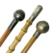 Three swagger sticks - leather covered with spherical terminal embossed with Oman Muscat emblem L68c