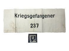 German POW armband printed in black 'Kriegsgefangener 237' on a white ground; and an 'SS' Reinhard H