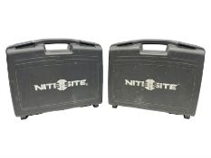 Two Nite-Site add-on kits in hard plastic carrying cases; one with charger