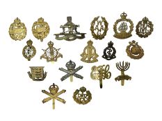 Seventeen cap badges including Expeditionary Forces Canteen