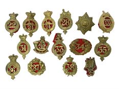Fifteen regimental cap badges