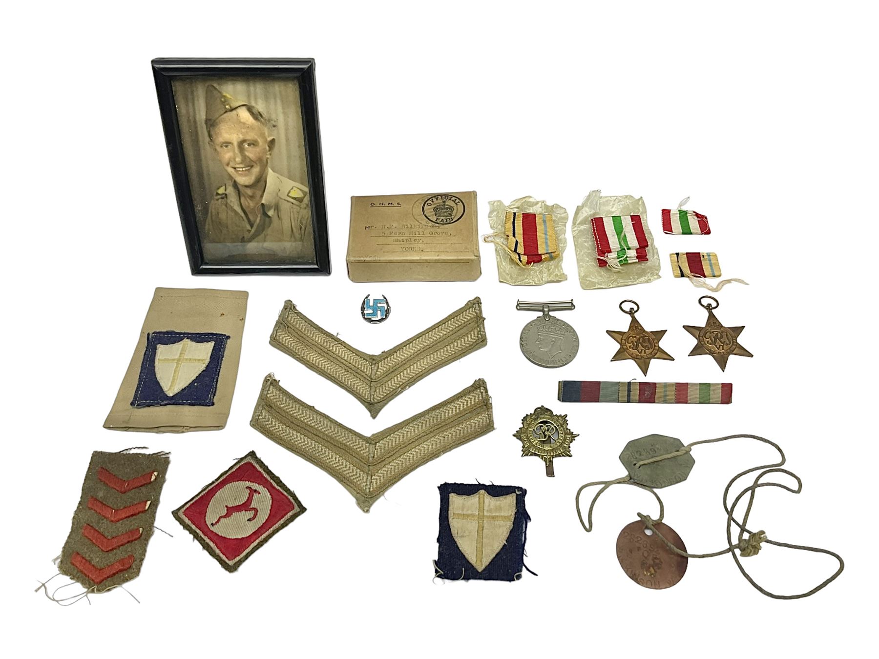 WWII group of three medals comprising 1939-45 War Medal and Italy and Africa Stars in issue box; dog