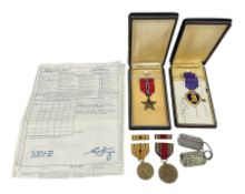 American Purple Heart Medal awarded to 32634848 Charles H. Poppo; cased with identity tags and paper