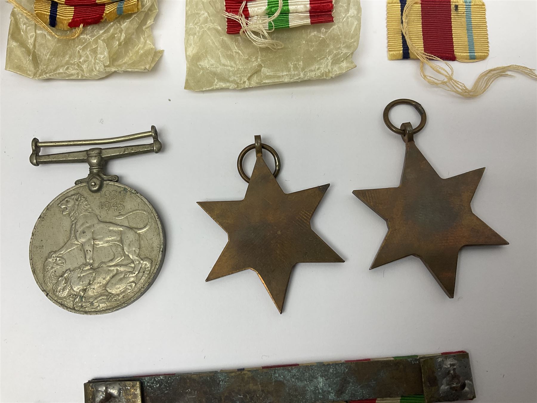 WWII group of three medals comprising 1939-45 War Medal and Italy and Africa Stars in issue box; dog - Image 9 of 14