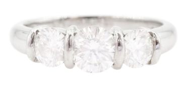 Platinum three stone round brilliant cut diamond ring by FEU