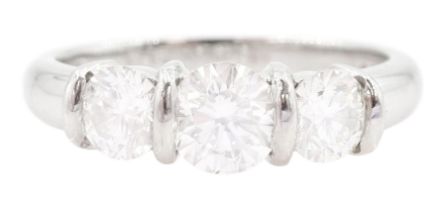 Platinum three stone round brilliant cut diamond ring by FEU