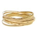 Seven 9ct gold bangles