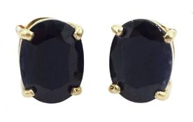 Pair of 9ct gold oval cut sapphire stud earrings