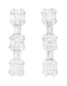 Pair of 18ct white gold baguette cut and round brilliant cut diamond stud earrings
