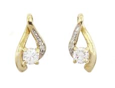 Pair of 9ct gold round brilliant cut diamond pendant stud earrings