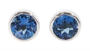 Pair of 9ct white gold round London blue topaz stud earrings