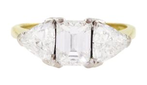 18ct gold three stone emerald cut and trillion cut diamond ring