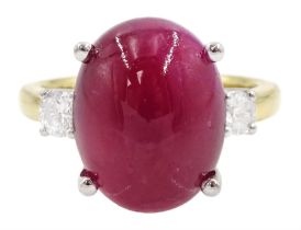 18ct gold three stone cabochon ruby and round brilliant cut diamond ring