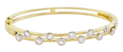 18ct gold rubover set round brilliant cut diamond hinged bangle