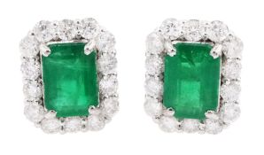 Pair of 18ct white gold emerald and round brilliant cut diamond stud earrings