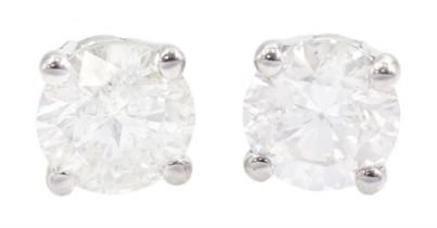 Pair of 18ct white gold round brilliant cut diamond stud earrings