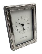 Modern silver mounted desk clock with battery powered movement