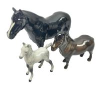 Three Beswick horses