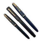Three Parker fountain pens