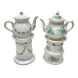 Two 19th century continental teapots and warmers