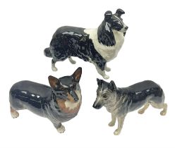 Three Beswick dog figures