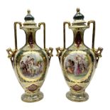 Pair of Vienna style twin handled urns and covers