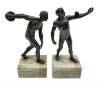 Bronzed model of the discus thrower and another of a episkyros player